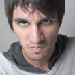 jeune homme nu regard de haine amertume