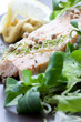 Salmon dish with salad