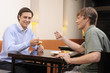 Two guys having a dessert