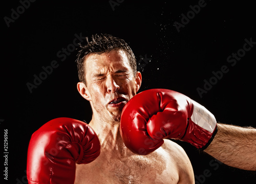 Photo: boxer being hit boxer being hit