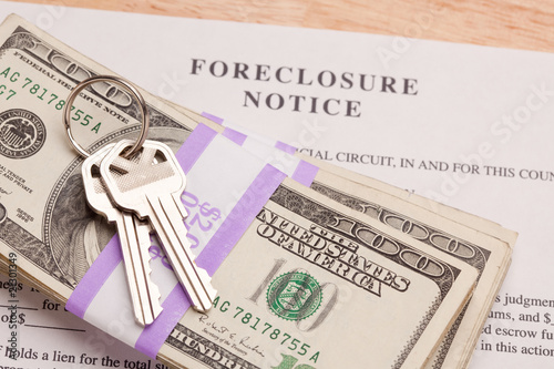 Photo: House Keys, Stack of Money and Foreclosure Notice House Keys, Stack of Money and Foreclosure Notice