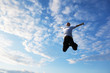 jumping happy young man