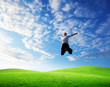 jumping happy young man