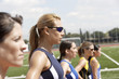 female athletes lining up to start race head and shoulders