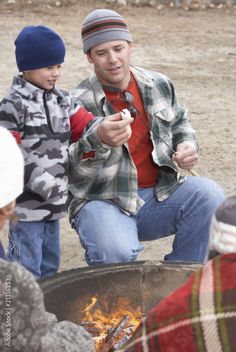 Photo: father and son (7-9) by campfire father and son (7-9) by campfire