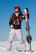 Girl skier with skis