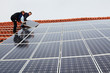 installing solar modules on a roof 04