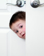 Foto: boy trying to enter the room boy trying to enter the room