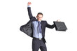 A happy young businessman jumping in the air A happy young businessman jumping in the air
