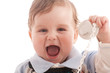 Photo: Portrait of joyful baby boy with pacifier Portrait of joyful baby boy with pacifier