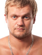 Head of brawny unshaven man