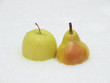 Apple and pear on a snow