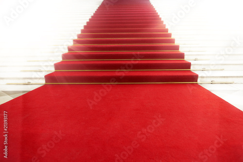 Photo : Staircase with red carpet, illuminated by light Staircase with red carpet, illuminated by light