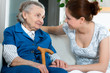 Senior woman with her home caregiver