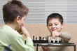 Kids playing chess
