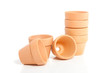 many brown terracotta flower pots isolated over white many brown terracotta flower pots isolated over white