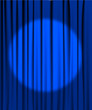 Blue curtain with a spotlight