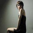 Young magnificent lady in elegant dress
