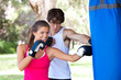 Photo: Young Couple Practicing Boxing Young Couple Practicing Boxing
