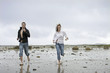Couple running at the beach Couple running at the beach