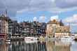 Port de Honfleur au printemps avec ciel bleu et beaux nuages. Port de Honfleur au printemps avec ciel bleu et beaux nuages.