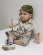 Important baby child boy 1 year 10 months draws pencil