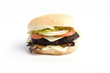 Beef burger with onion rings, tomato and lettuce