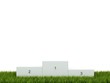 White podium on green grass White podium on green grass