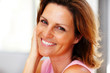 Photo: Closeup portrait of pretty young woman posing Closeup portrait of pretty young woman posing