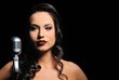 Attractive brunette woman with a retro microphone . Attractive brunette woman with a retro microphone .