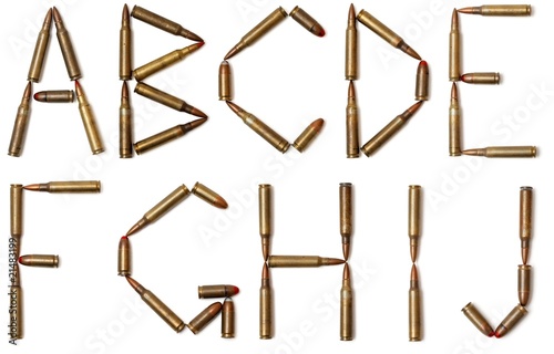 Photo: Letters made of cartridges isolated Letters made of cartridges isolated