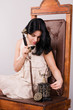 Photo: Beautiful woman speaks by ancient phone Beautiful woman speaks by ancient phone