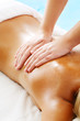 Massage Techniques IV - woman receiving professional massage.