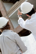 Architetcs looking at a building