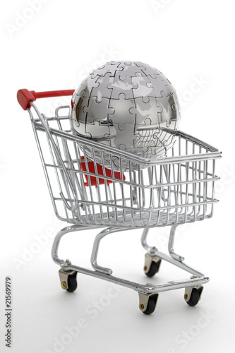 Photo: Metal puzzle globe with shopping cart Metal puzzle globe with shopping cart