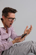 a young man with a phone
