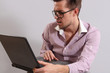 a young man with a laptop