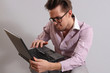 a young man with a laptop