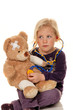 Child with a stethoscope as a doctor.
