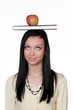 Student with apple and books on learning