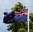 Photo of a New Zealand Flag waving Photo of a New Zealand Flag waving