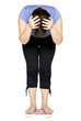 Woman standing on scales.