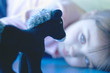 Girl Staring at Her Stuffed Toy Horse