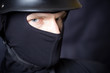 Man in helmet and mask staring at you