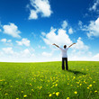 field of grass and happy young man