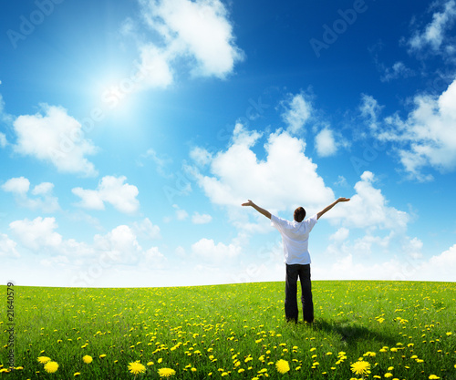 Photo: field of grass and happy young man field of grass and happy young man