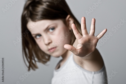 Photo: Child with her Hand Up Child with her Hand Up