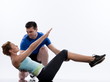 couple, on Abdominals workout posture on white background.