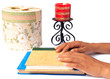 Hands placed on books Hands placed on books
