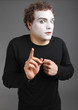 Foto: portrait of the mime isolated on grey background portrait of the mime isolated on grey background